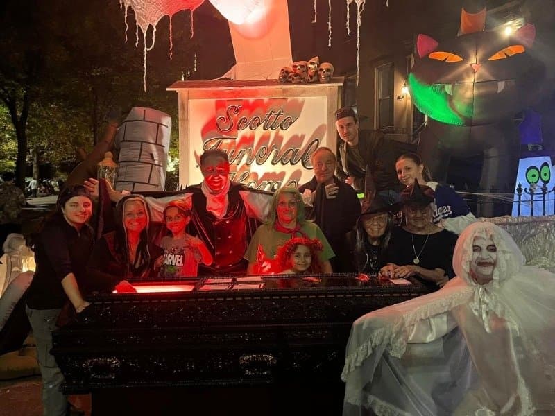 Staff in costume at the Scotto Funeral Home Halloween display in Carroll Gardens