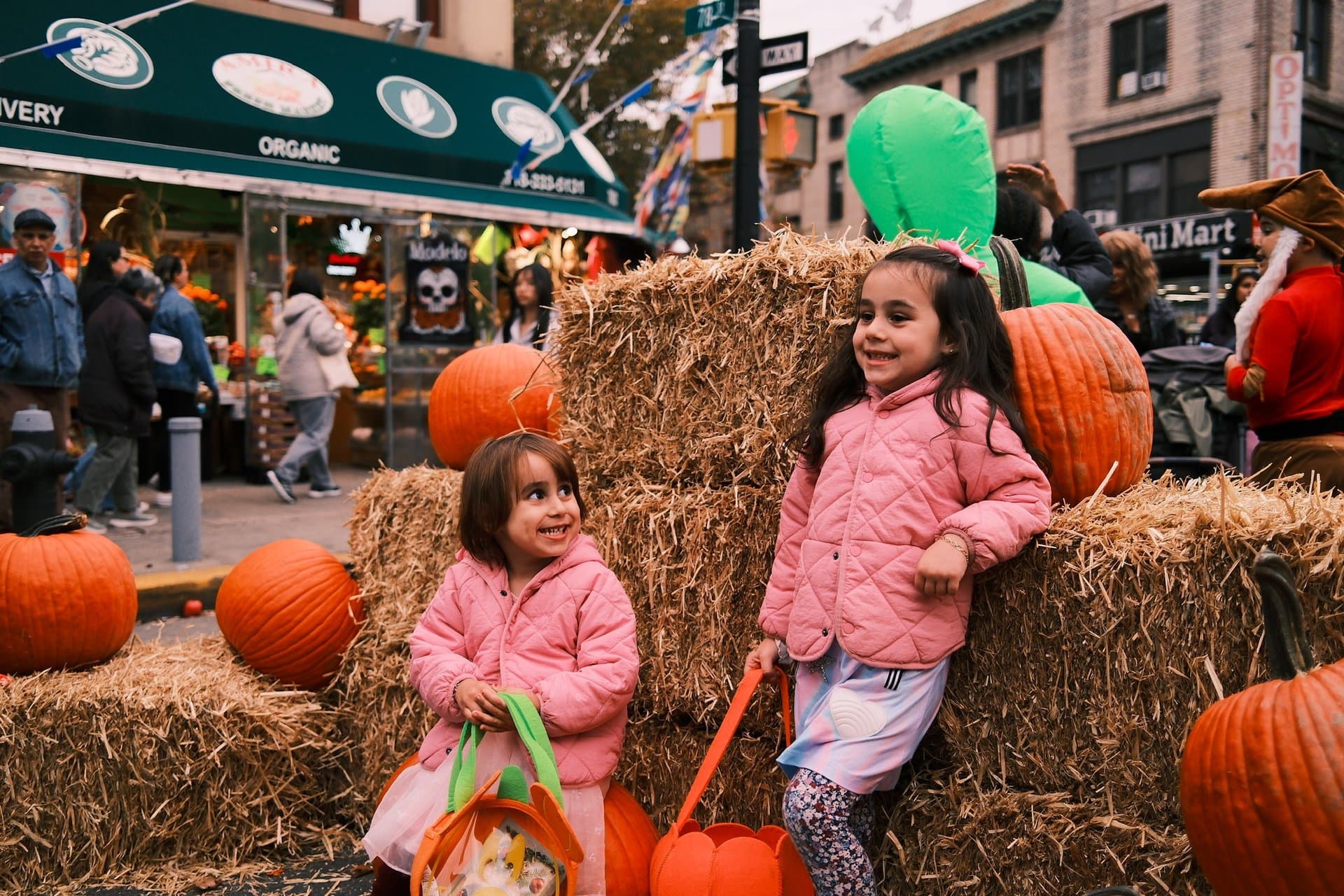 Families in costume at the Bay Ridge Halloween Fest on Fifth Avenue