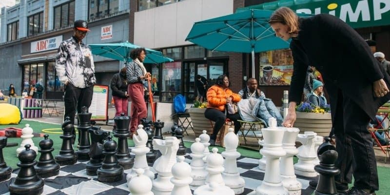 People at a Downtown Brooklyn open-street event on Willoughby Street